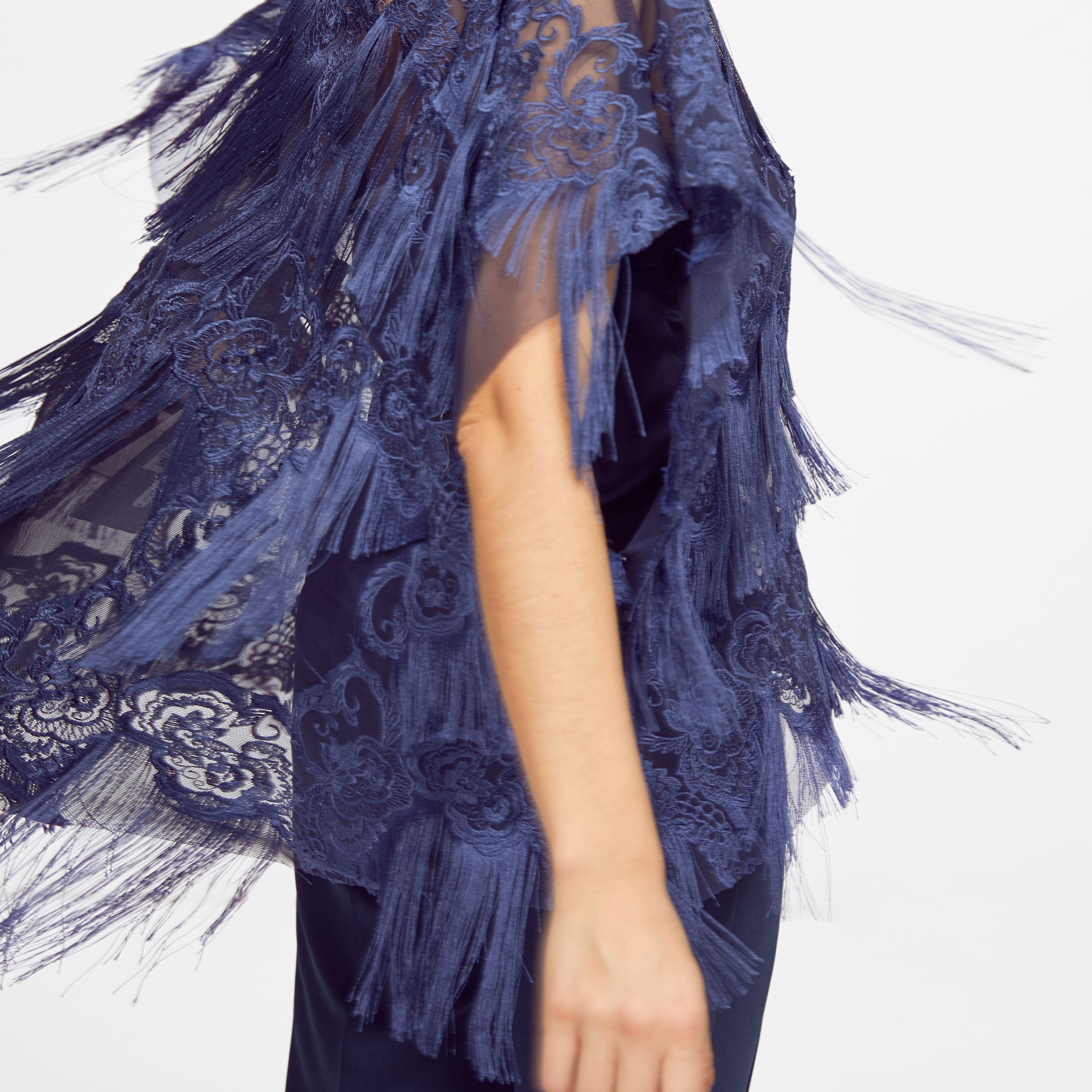 Tulle poncho with fringes