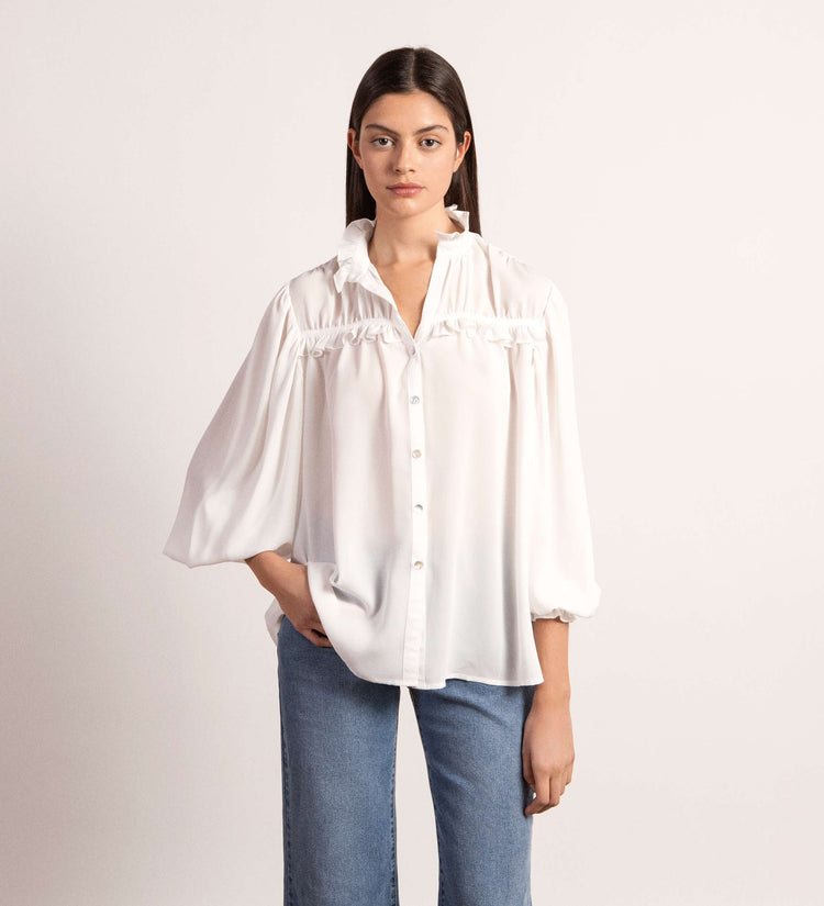 Blusa detalles volantes