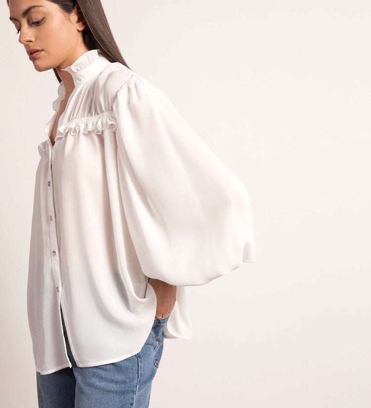 Blusa detalles volantes