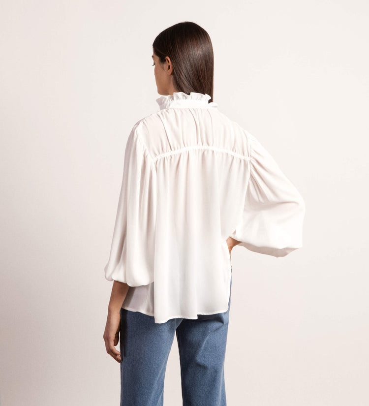 Blusa detalles volantes