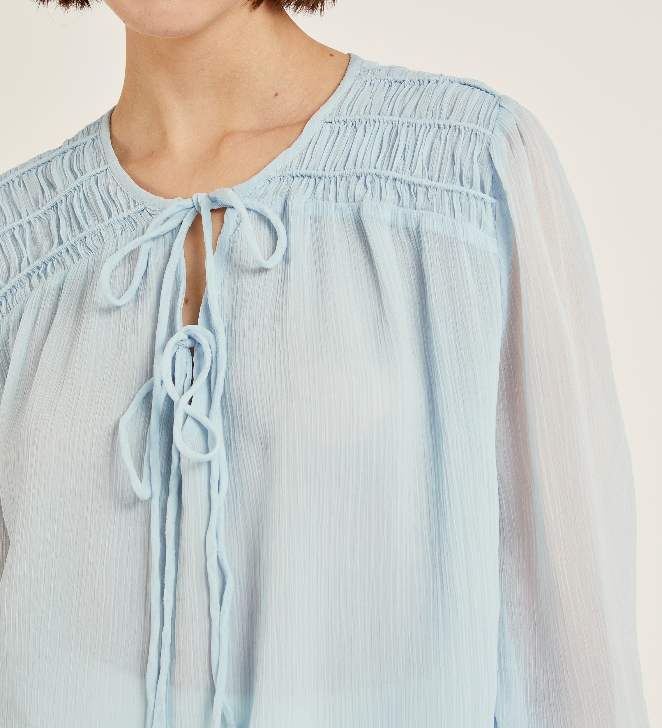 Blusa tejido efecto arrugado