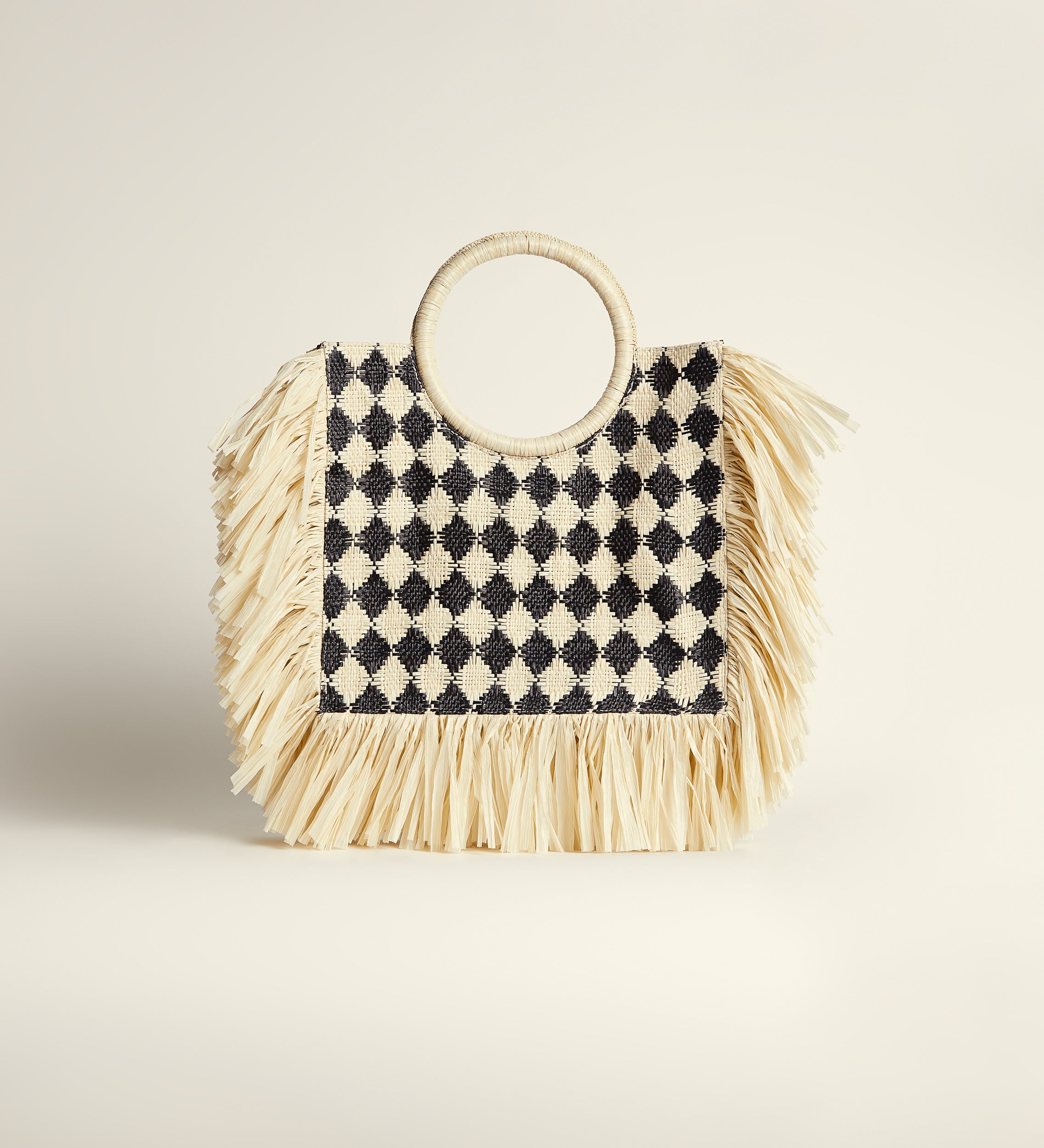 Fringed raffia bag