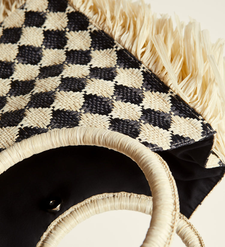 Fringed raffia bag