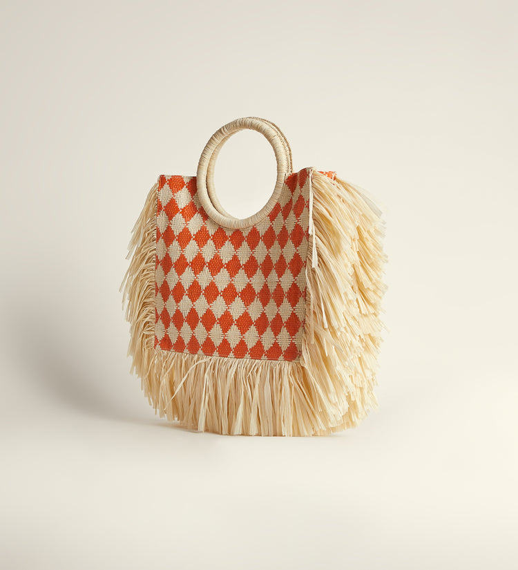 Fringed raffia bag