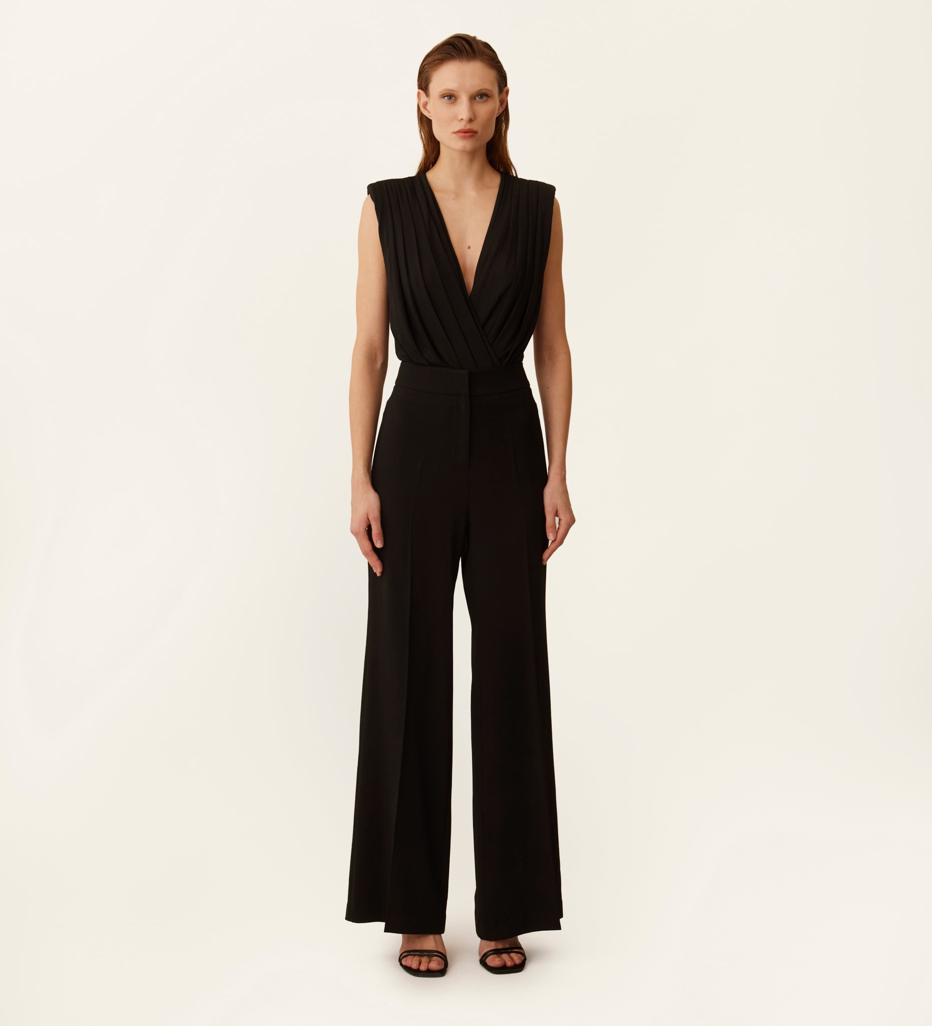 Flared hem crepe trousers